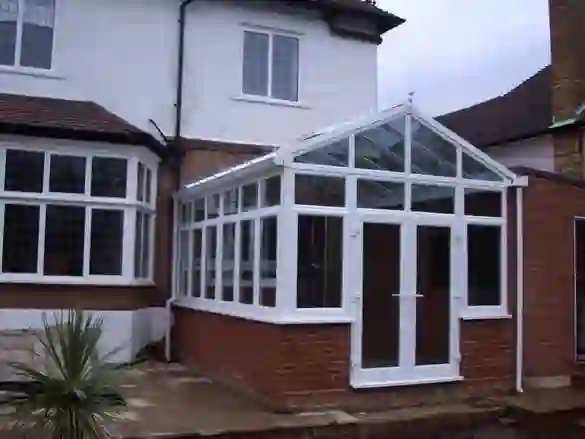 Gable-end conservatory with a full-height glazed gable front