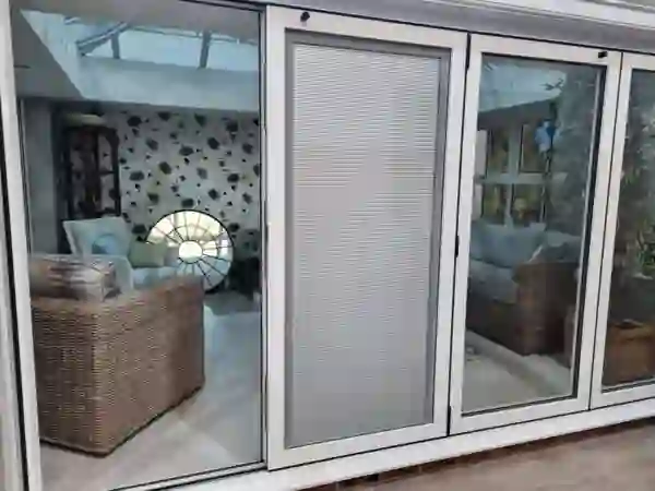 Integral glass blinds installation showing the magnetic control