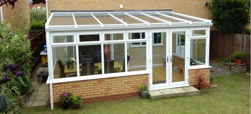 Lean-to conservatory with a single-slope roof fitted to a bungalow