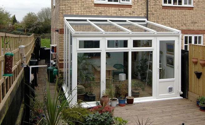 Lean-to conservatory interior with garden view