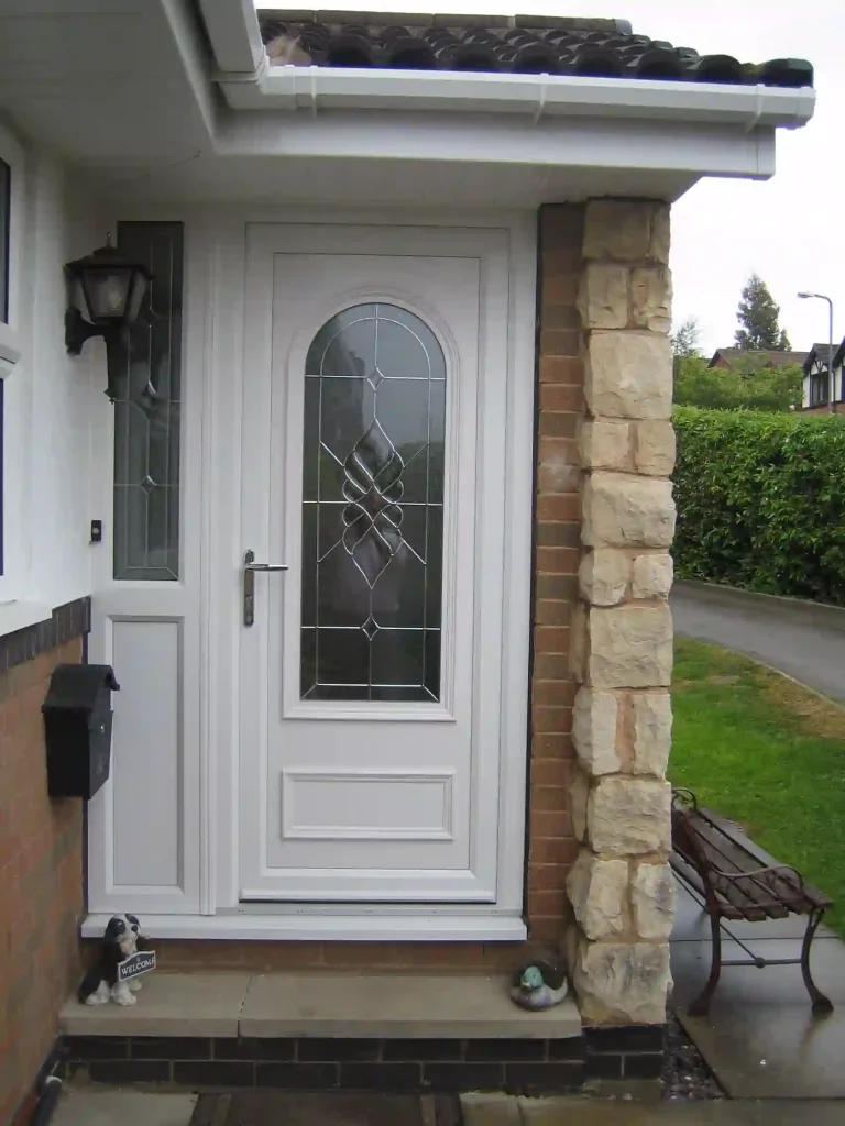 White uPVC front door with glazed panel and sidelight