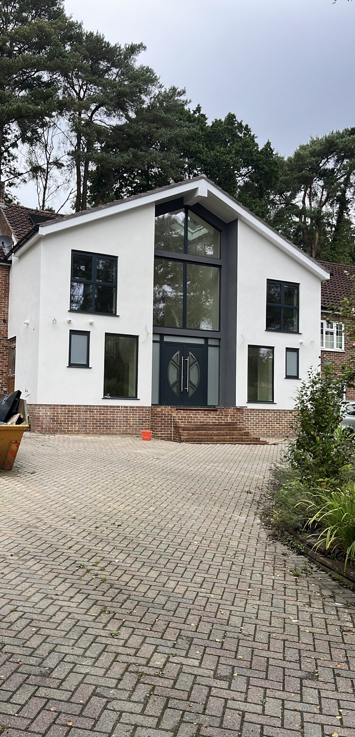 Aluminium hinged entrance door installation